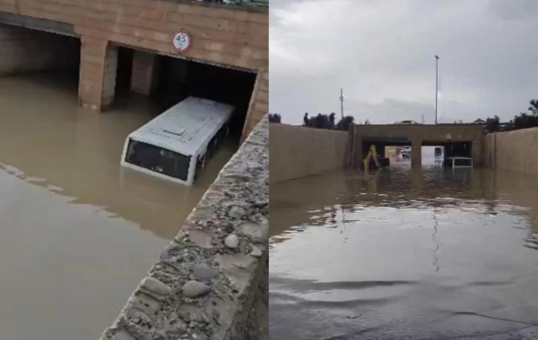 Bakıda sərnişin avtobusu suyun içində qaldı - Sərnişinlər kəndirlə xilas edildi... VİDEO